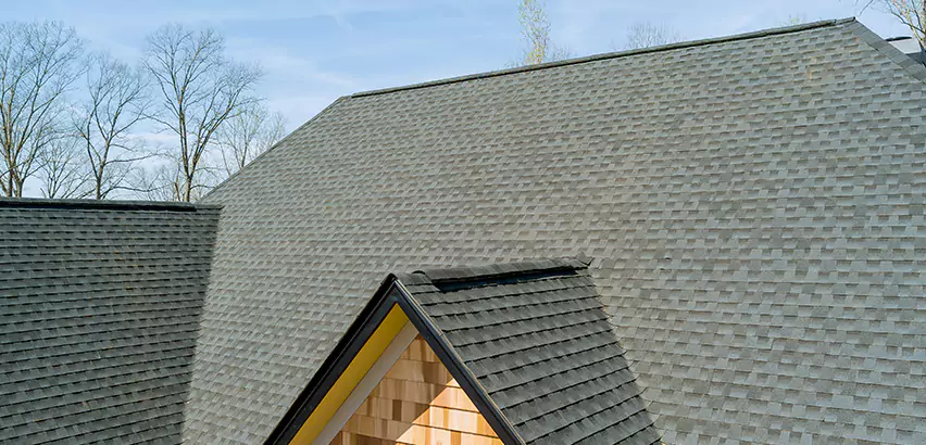 Replacing Vinyl Siding With Cedar Shingles in Carpentersville