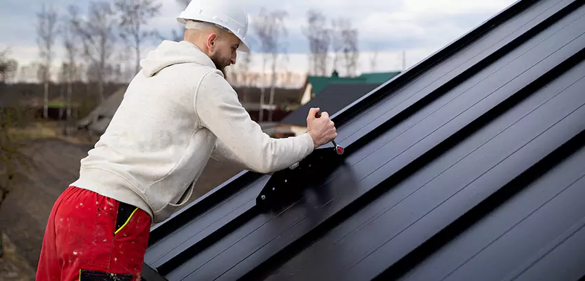 Tin Roof Ridge Cap Installation in Carpentersville